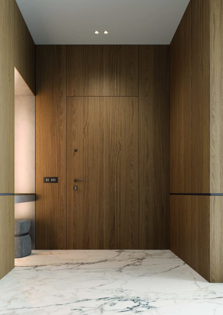 Ingresso con boiserie in rovere e porta blindata filo muro rivestita in legno, pavimento in marmo (verticale)