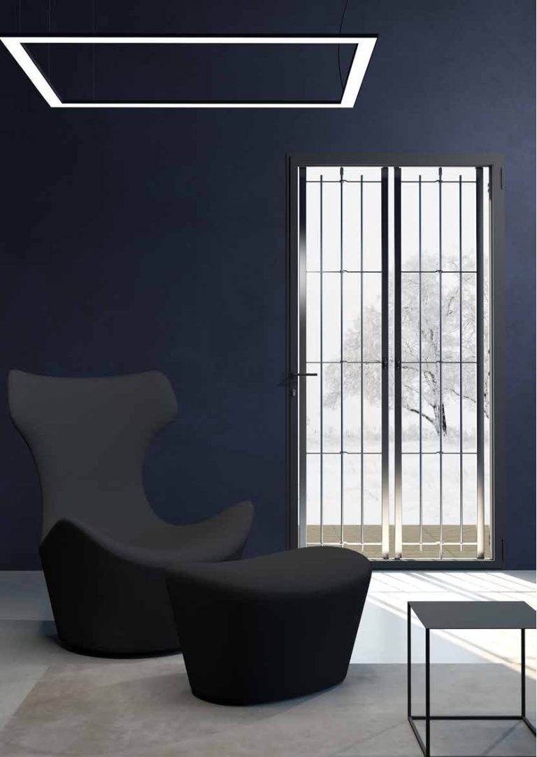 Render: interno blu scuro con poltrona e grata Tenace in acciaio inox